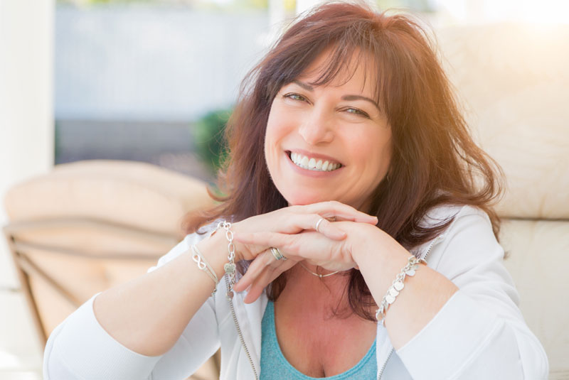 Dental Patient Smiling After Her Dental Implant Procedure