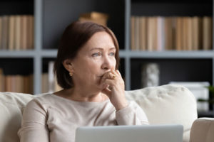 Dental Patient Wondering If She Should Get Dental Implants Or Dentures in Bronx, NY