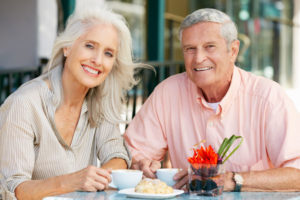 Dental Implant Patients Eating Together With Their False Teeth in the Bronx, NY