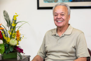 Dental Implant Patient Smiling After Getting His Full Arch Dental Implants With Dr. Moore In the Bronx, NY